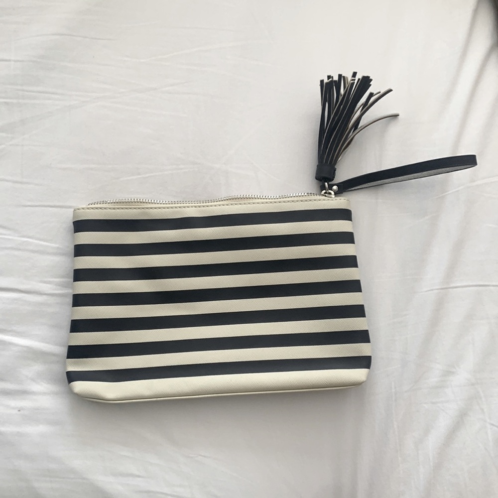 Navy and cream clutch with tassel